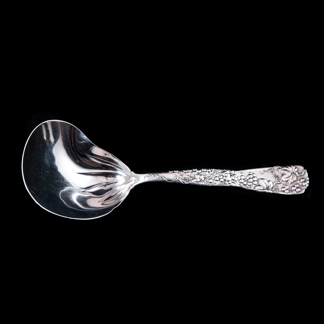 A TIFFANY VINE CASSEROLE SPOON WITH