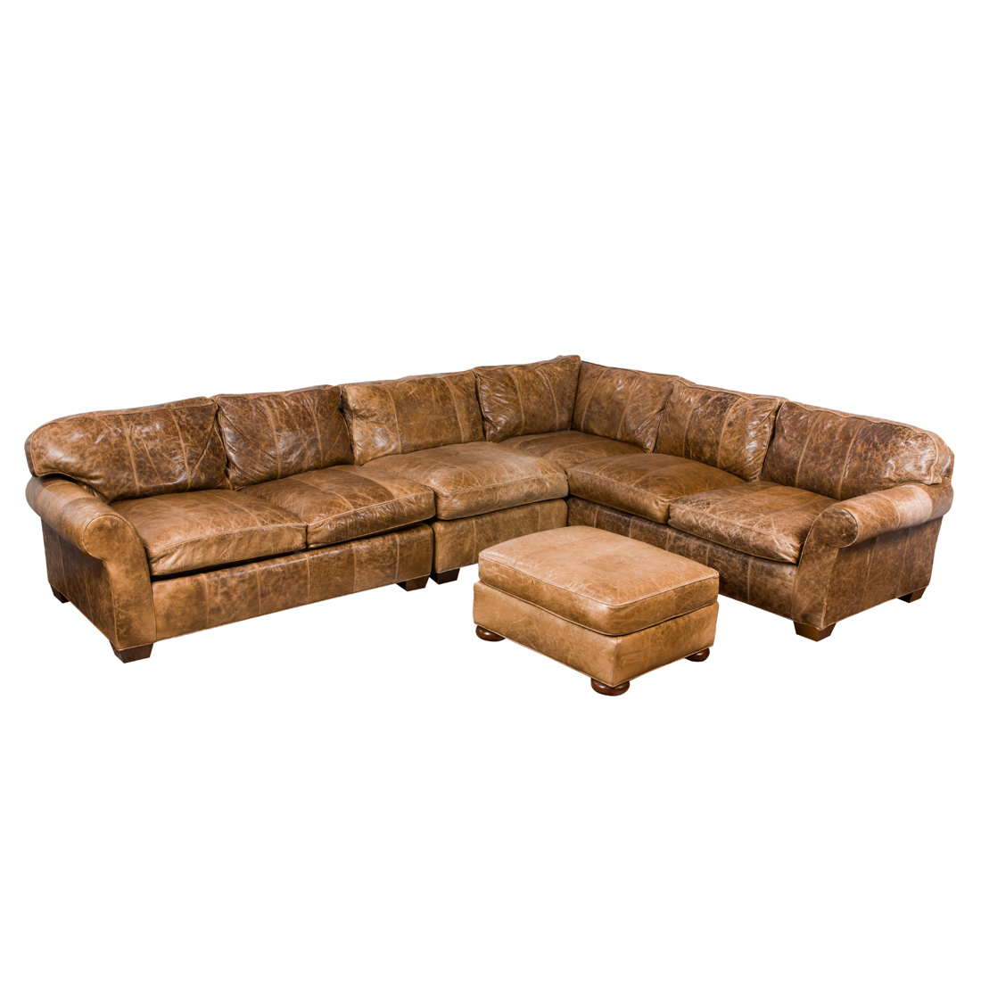 A CONTEMPORARY BROWN LEATHER SECTIONAL