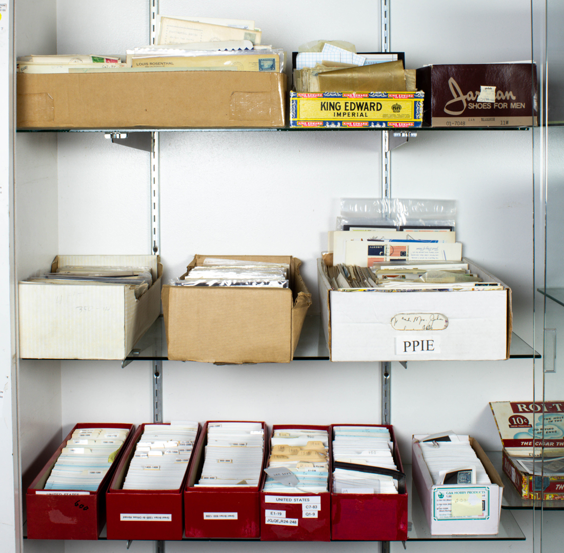 THREE SHELVES OF ASSOCIATED BOXES OF