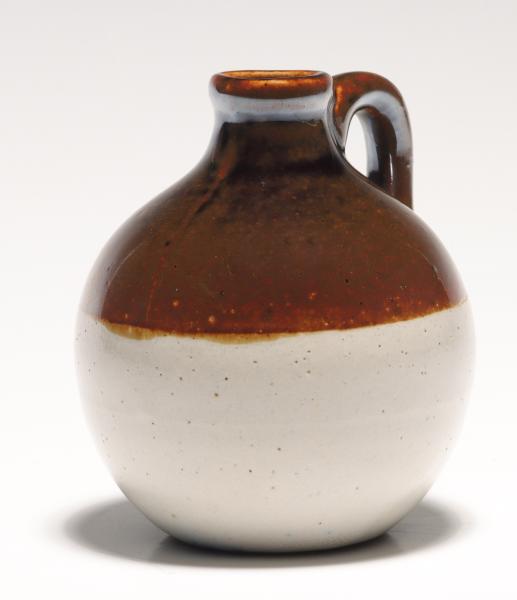 AN UNDATED STONEWARE MINIATURE