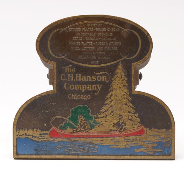 A PICTORIAL BRASS BILL CLIP FOR