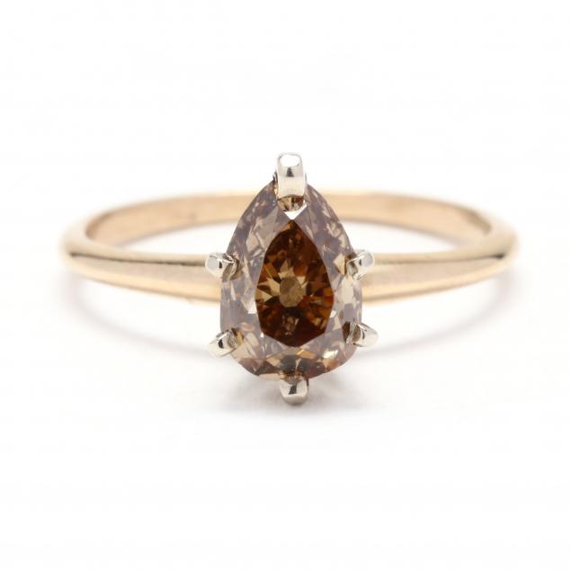 GOLD AND PEAR CUT DIAMOND RING