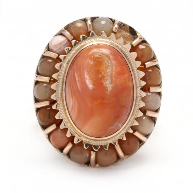 GOLD AND FIRE OPAL RING Centering