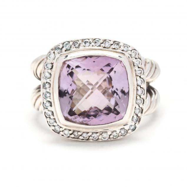 STERLING SILVER AND AMETHYST RING,