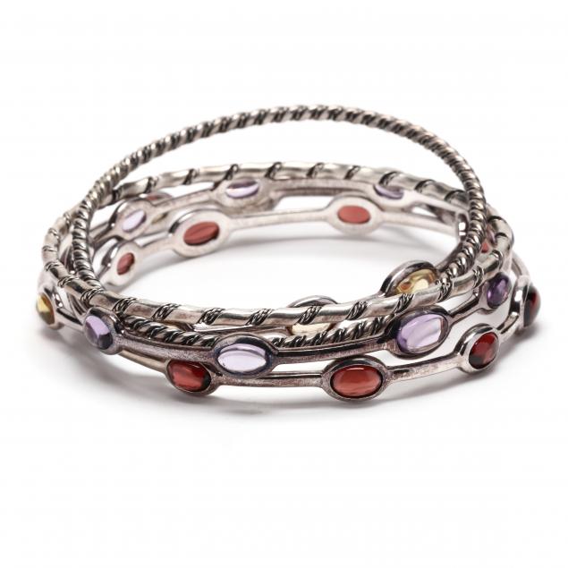 FIVE SILVER BANGLES To include: