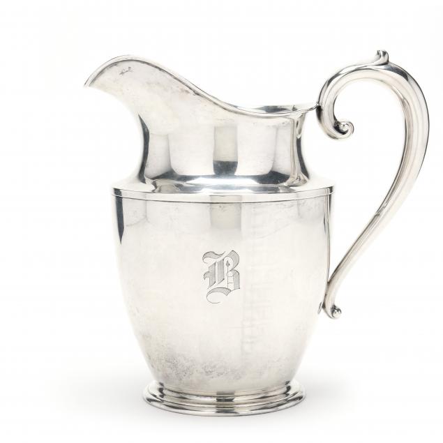 A STERLING SILVER PITCHER BY WALLACE