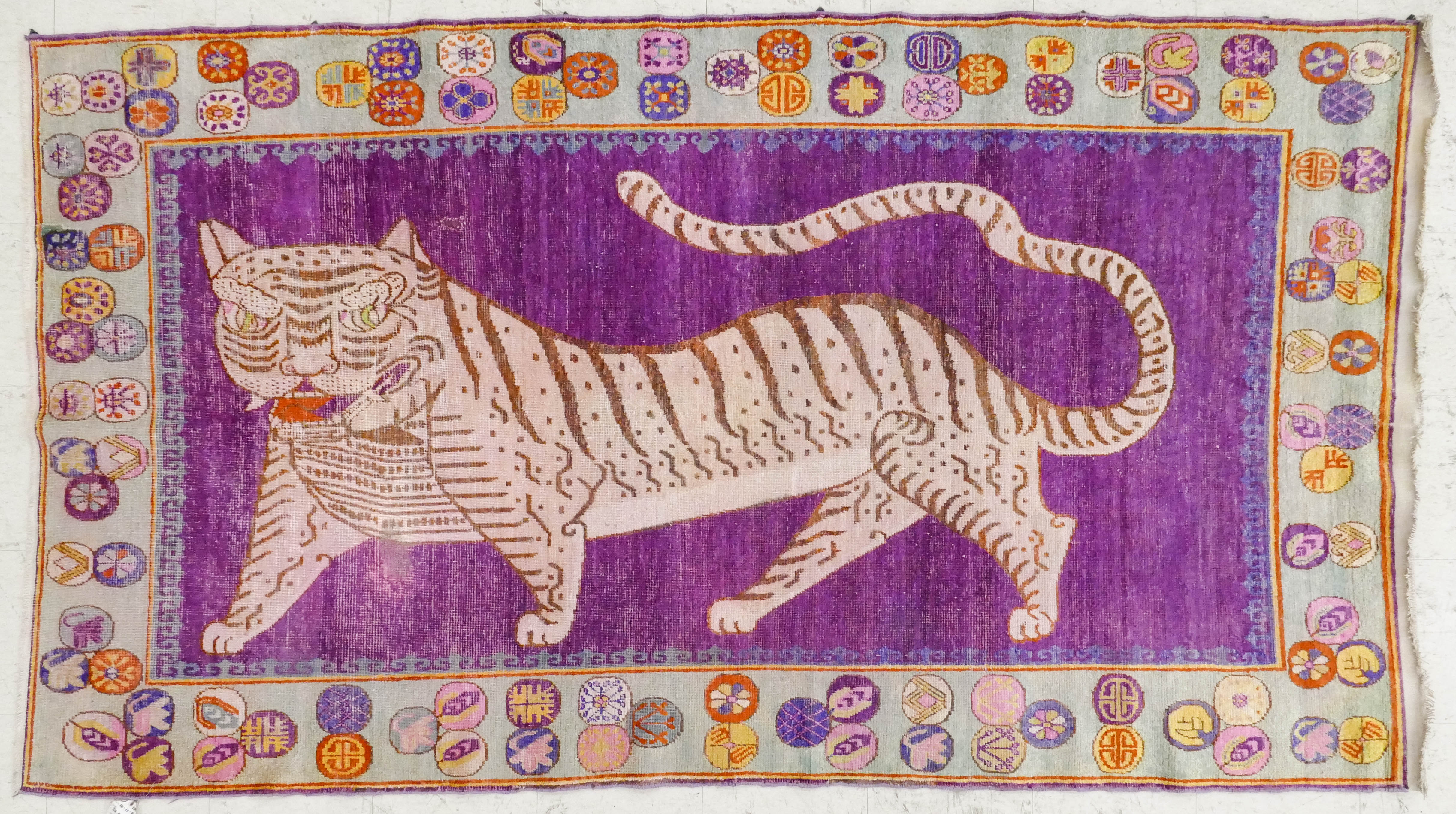 Antique Khotan Tiger Oriental Rug.