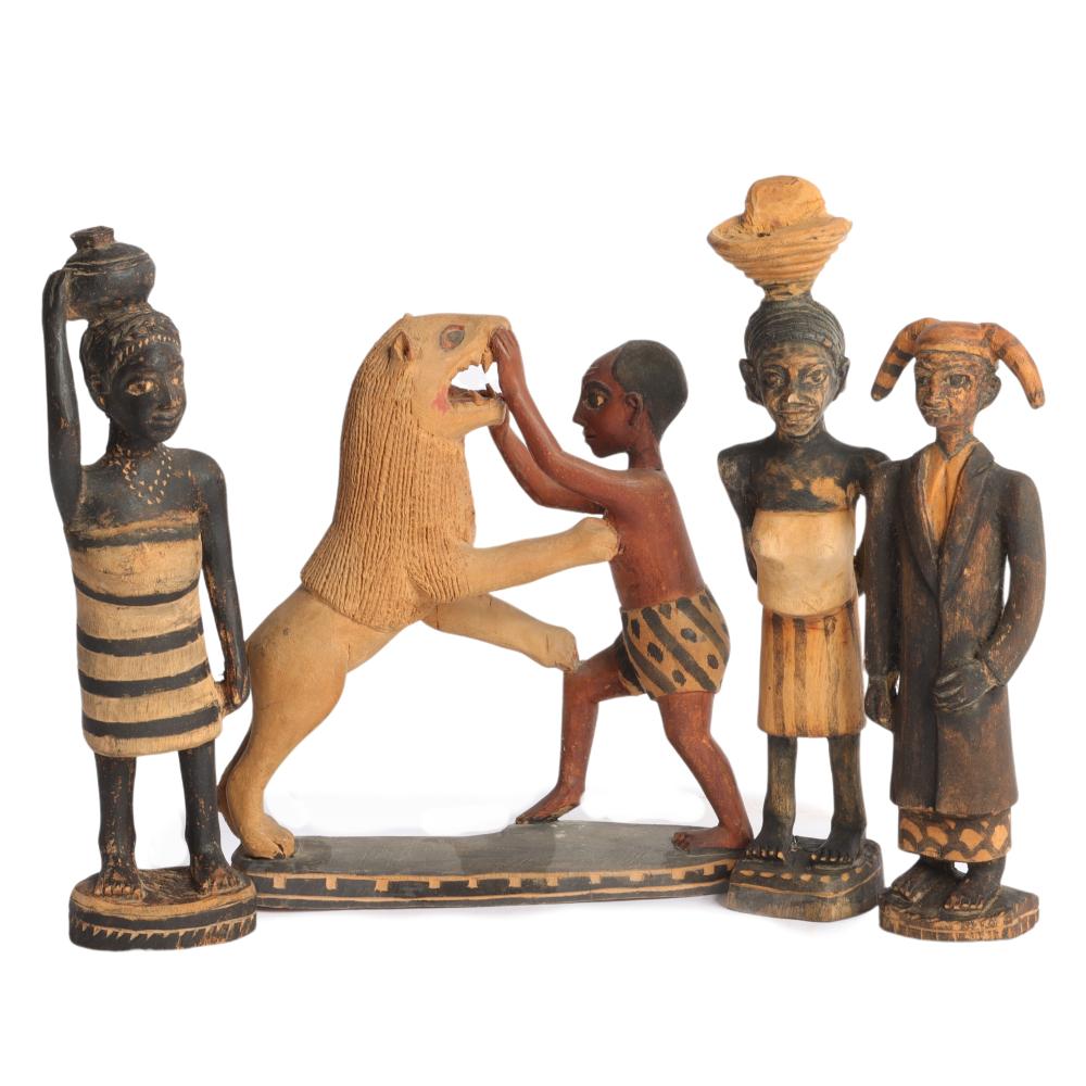 FOUR AFRICAN HAND-CARVED AND PAINTED