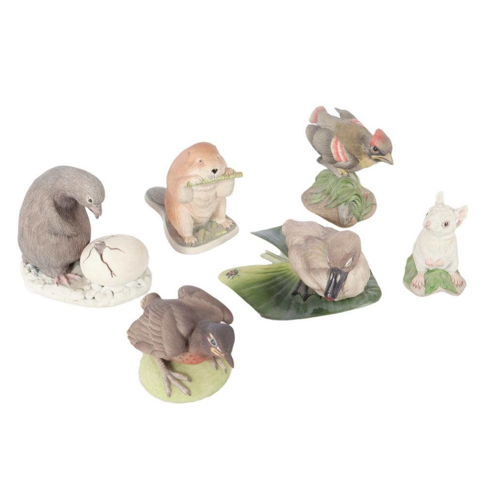 SIX PORCELAIN BISQUE ANIMAL FIGURINES: