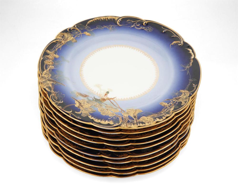 A SET OF LIMOGES PORCELAIN PLATESA