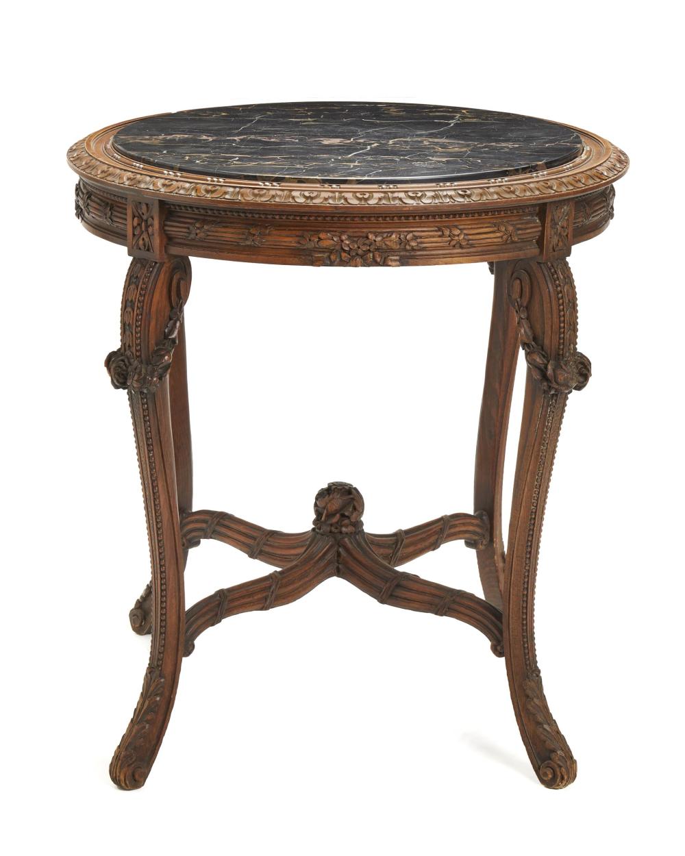 A CARVED TABLE WITH MARBLE TOPA