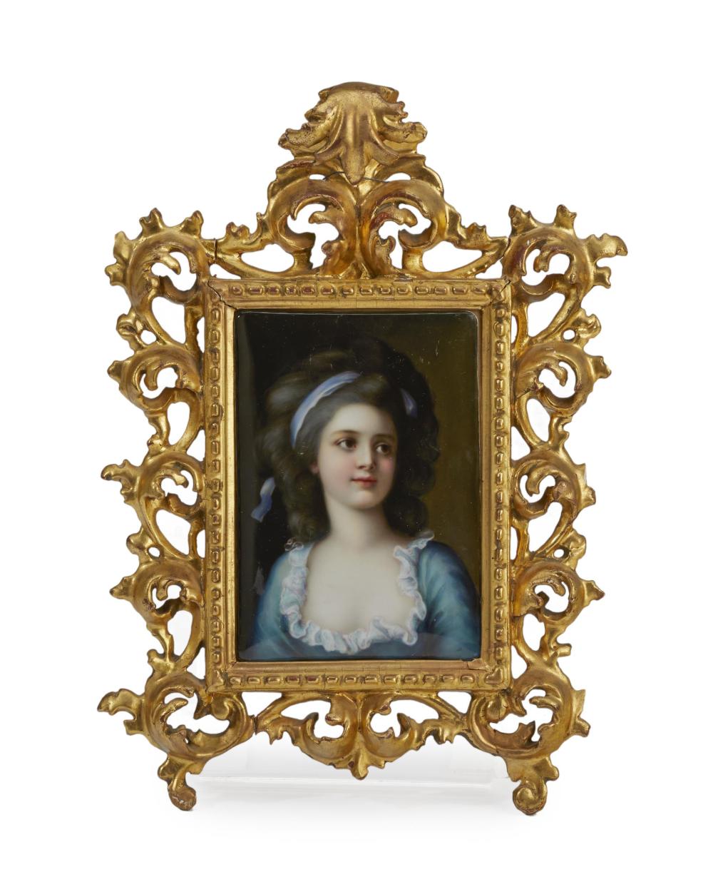 A FRAMED PORCELAIN PORTRAIT PLAQUEA