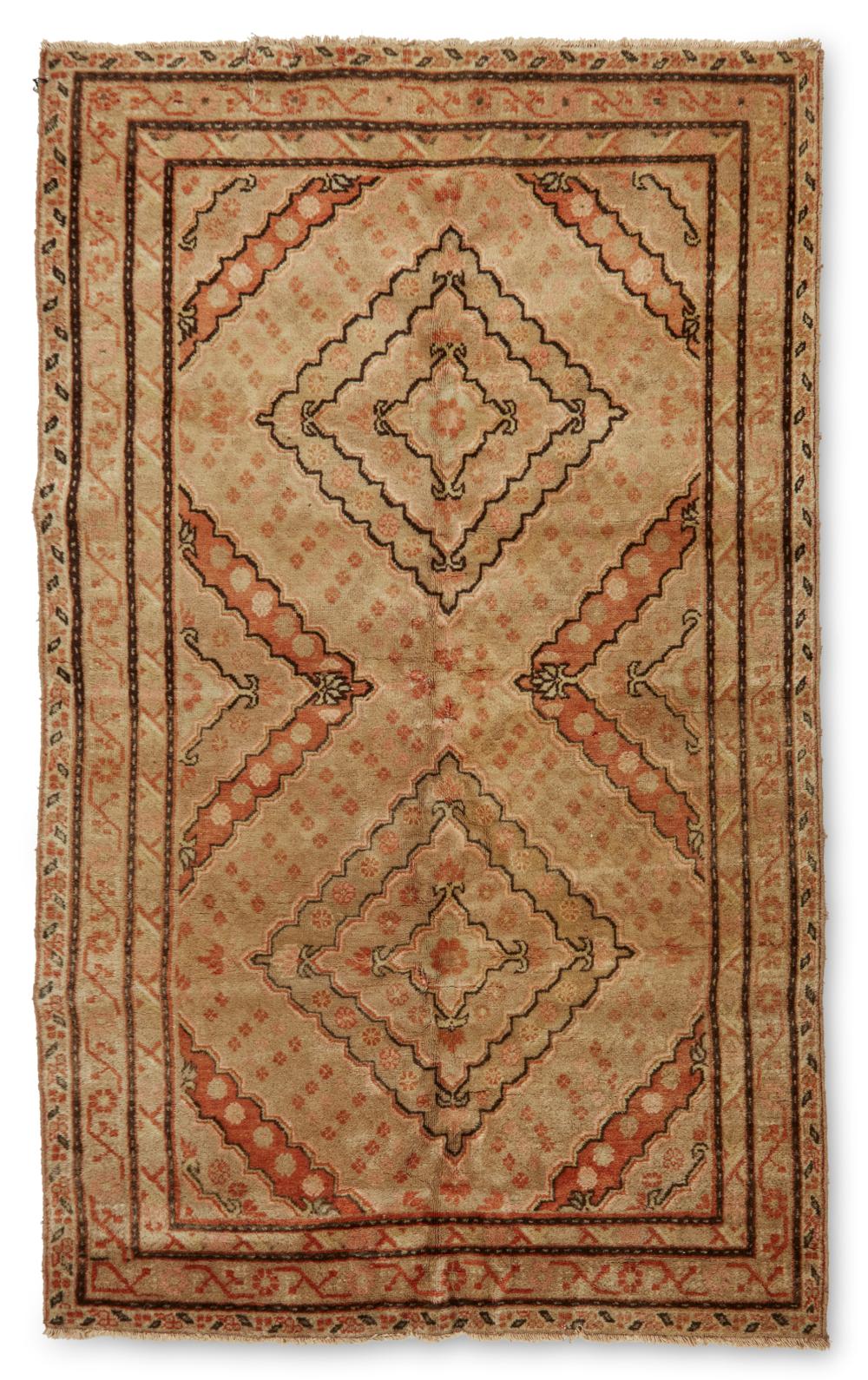 A KHOTAN RUGA Khotan rug,  Early