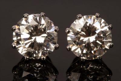 A pair of brilliant cut diamond ear