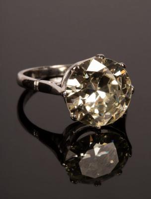 A diamond solitaire ring, the single