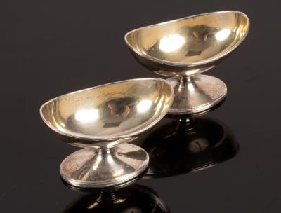 A pair of George III oval silver