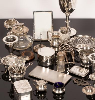 A silver prize cup, various silver vases,