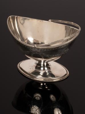 A George III swing handled silver