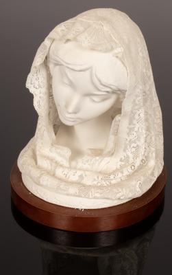 A Lladro bust of young girl wearing