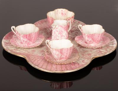 A pink shell moulded tea service,