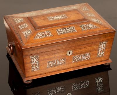 A Regency rosewood sarcophagus shaped 2db131