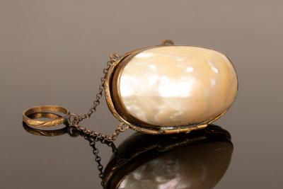 A late 19th Century gilt metal mother-of-pearl