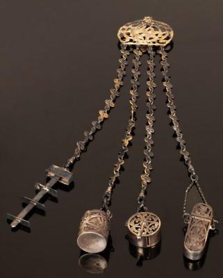 A trefoil-shaped chatelaine, the silver