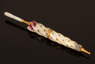 A mother-of-pearl needle case in the