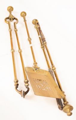 A matched set of four brass fire irons/Provenance:
