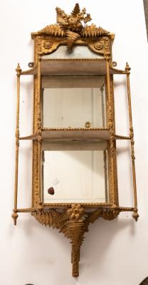 Two giltwood and plaster mirror back