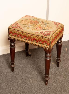 A George IV upholstered stool on