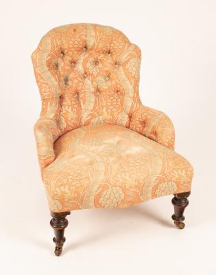 A Victorian upholstered armchair, with