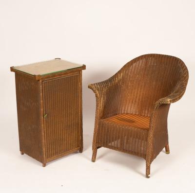 A Lloyd Loom chair and bedside cupboard