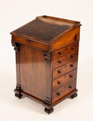 An early Victorian rosewood Davenport,