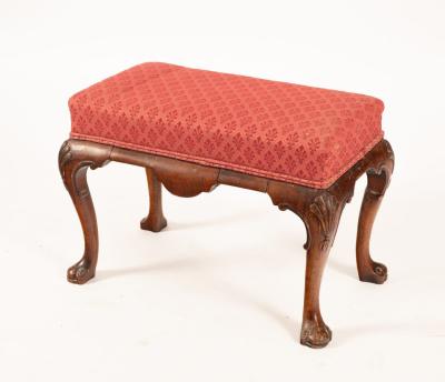 A Queen Anne style stool with upholstered