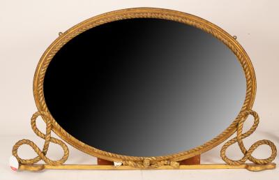 An oval overmantel mirror with 2db27e