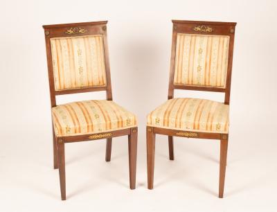 A pair of Empire style chairs,