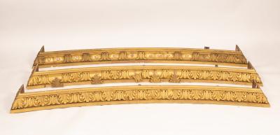 A set of three curved giltwood