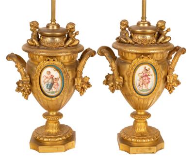 A pair of gilt metal table lamps