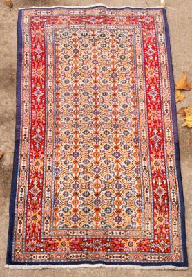 A West Persian rug, 191cm x 84cm