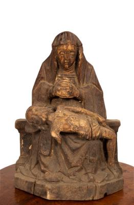 A 17th Century carved wooden figure