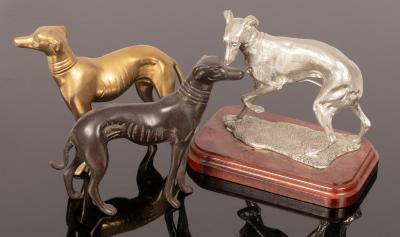 A cast metal figure of a whippet,