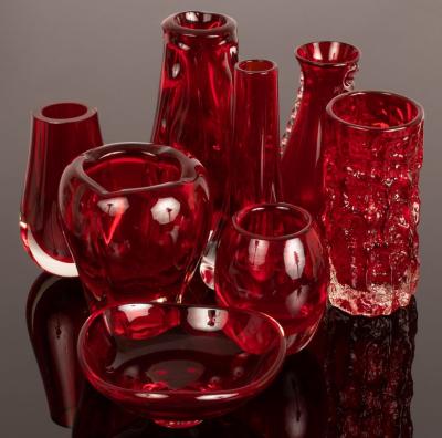 Seven Whitefriars red glass vases,