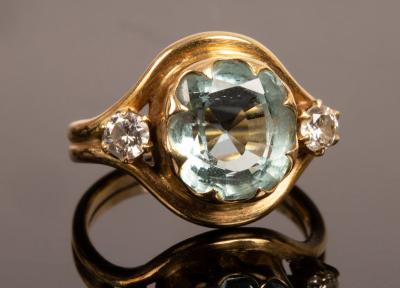 An aquamarine and diamond ring,