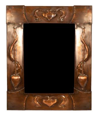 An Arts & Crafts style copper mirror,