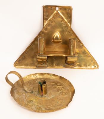 An Arts & Crafts brass triangular
