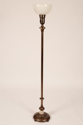 A bronzed metal torchere of Art Deco