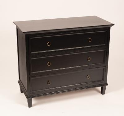 An ebonised chest of three long drawers,