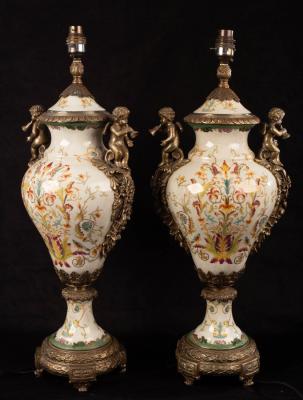 A pair of vase-shaped pottery lamps
