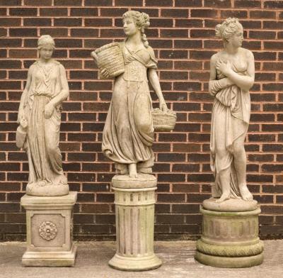 Three compositon stone figures of classically